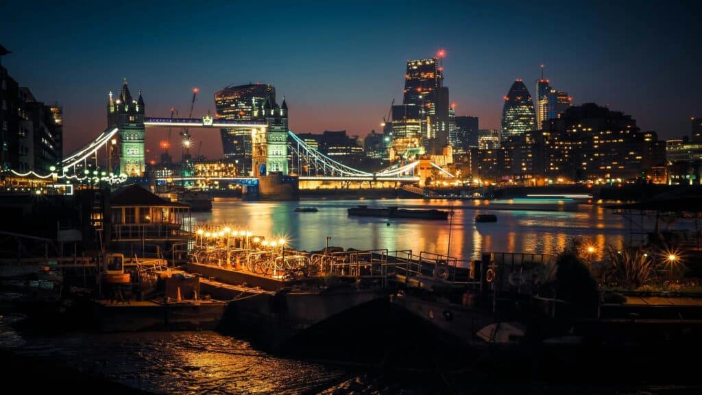 View of London skyline with Tower Bridge at night