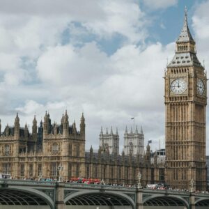 London black cab in front of Big Ben during a day trip tour