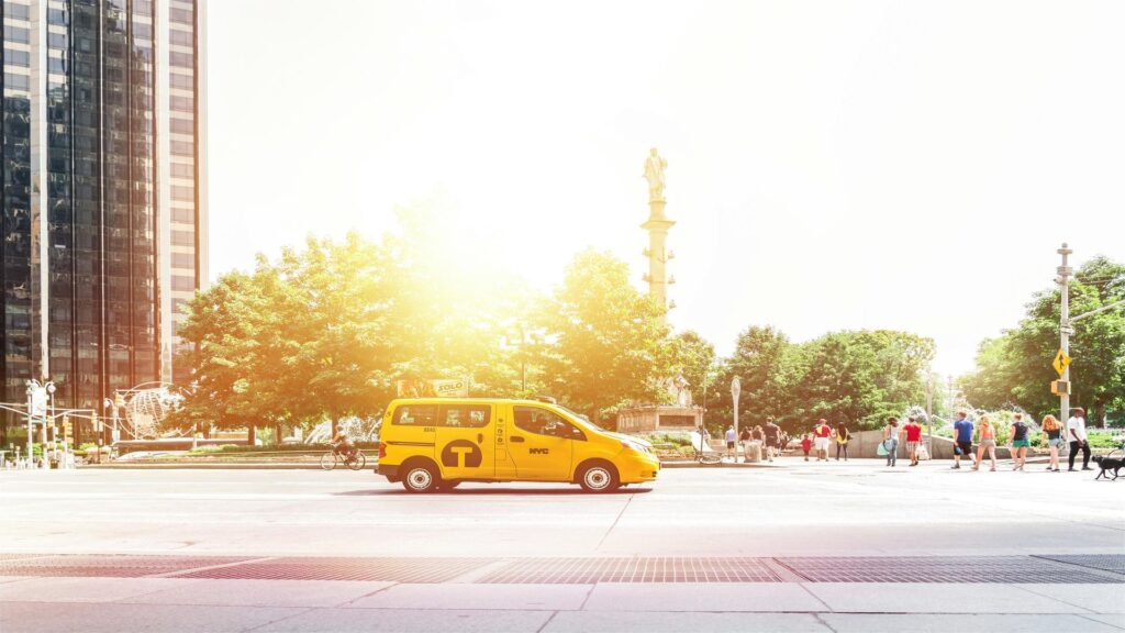 Taxi with London Eye in background