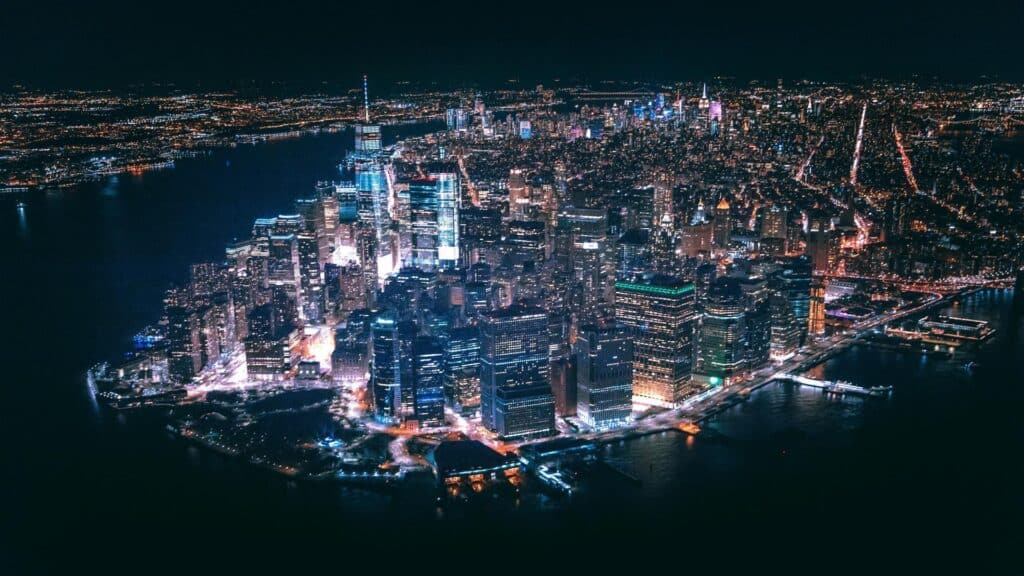 Aerial view of a city illuminated at night