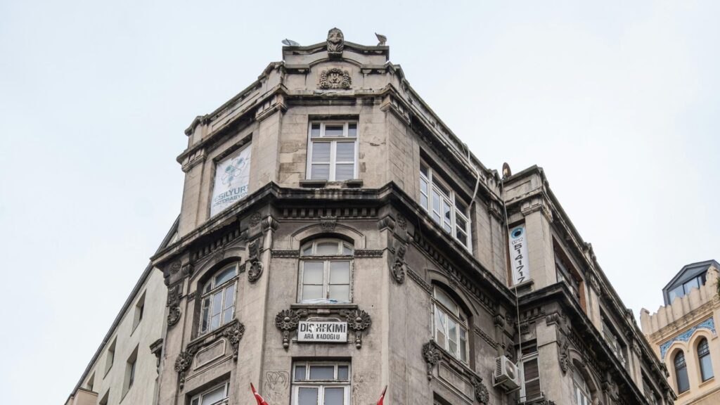 A historic stone building with intricate architectural details in London.