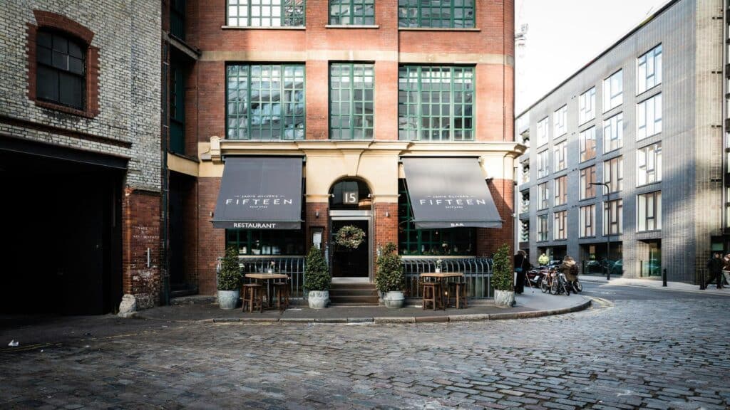 Exterior of a quaint restaurant in a city setting