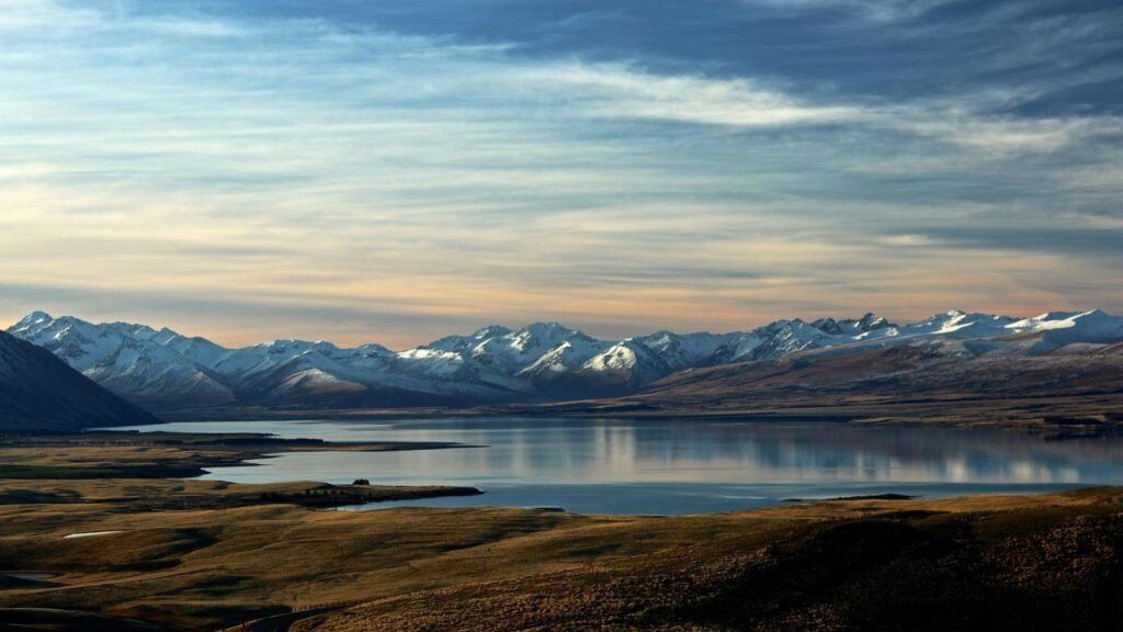 Snow-capped mountains and a serene lake