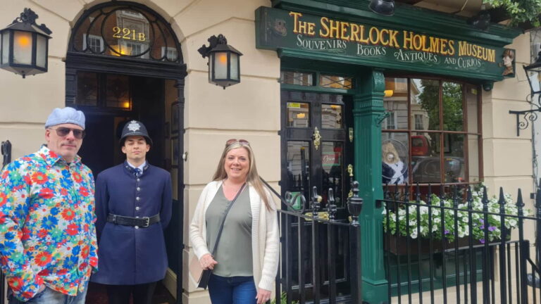 Visitors outside the Sherlock Holmes Museum in London during a sightseeing tour