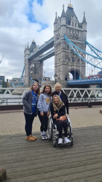 Group visiting Tower Bridge in London, showcasing wheelchair accessibility and sightseeing tours - 10 Best Things To See In London