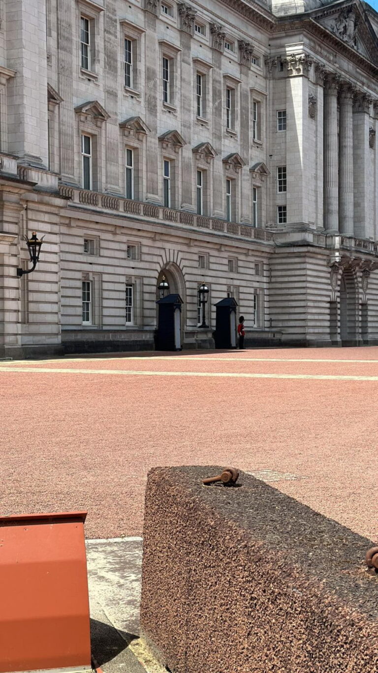 Places To Visit Near London UK - Buckingham Palace with a guard standing at the post