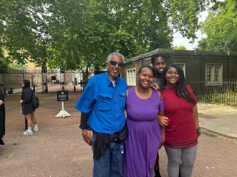 Group enjoying London In A Day Tour near a historic site