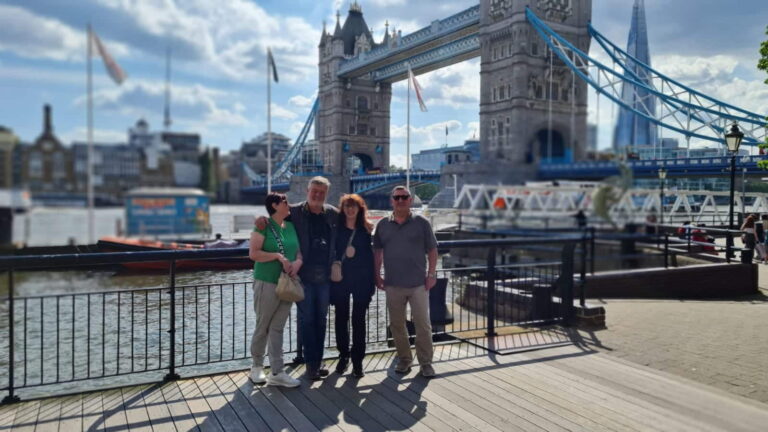 Group enjoying a Free Tour London experience near Tower Bridge