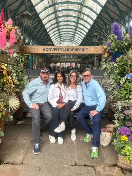 Visitors enjoying a London Changing Of The Guard Tour stop at Covent Garden, London.
