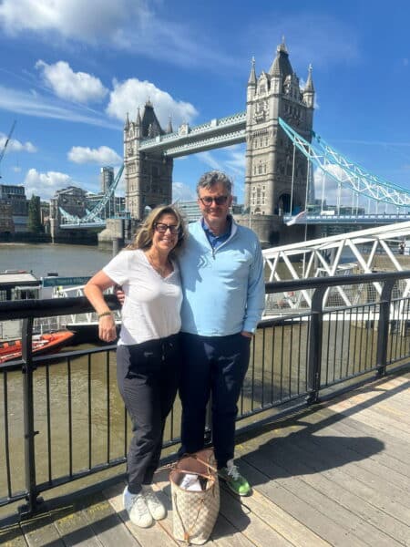 Tourists enjoying a perfect day trip in London what to do at Tower Bridge with London Sightseeing Taxi Tours