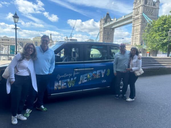 Day In London Ideas - Group enjoying a sightseeing taxi tour near Tower Bridge in London
