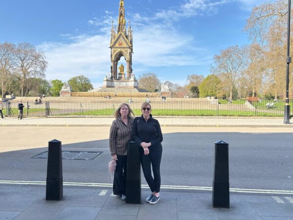 Visitors enjoying Royal Family Tour London with iconic Albert Memorial in the background