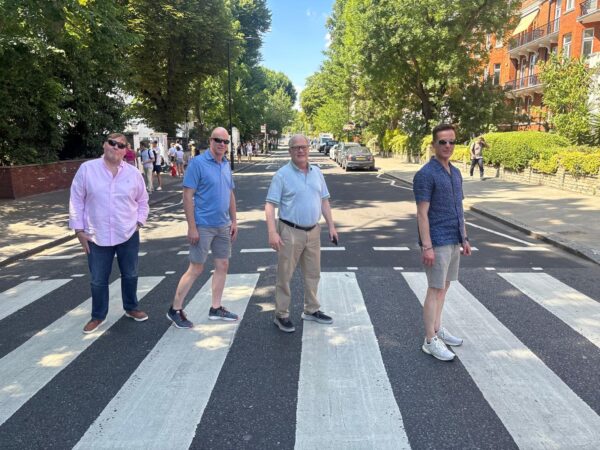 Tourists capturing unforgettable moments during their personalized black cab sightseeing itinerary