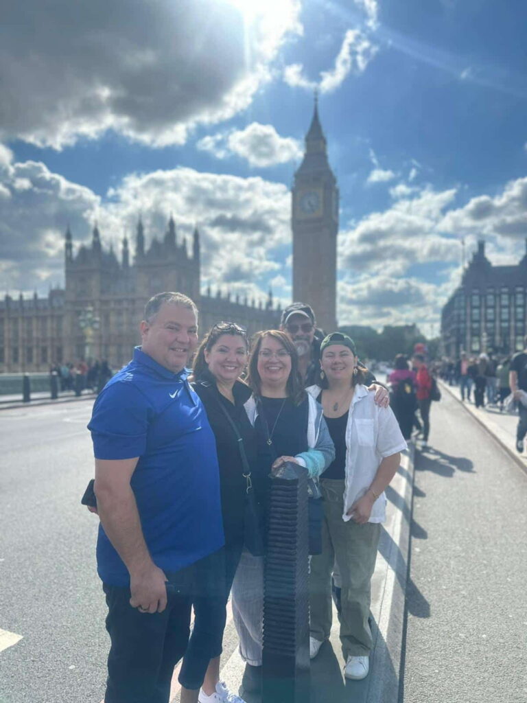Must Have London sightseeing tour group enjoying a London Sightseeing Taxi Tour near Big Ben and Westminster
