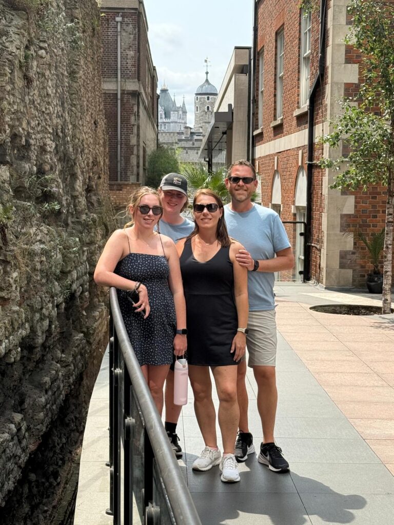 Group enjoying a Quick Trip To London with London Sightseeing Taxi Tours next to historic London landmarks