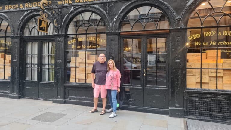Visit To London City, iconic wine merchant storefront with tourists