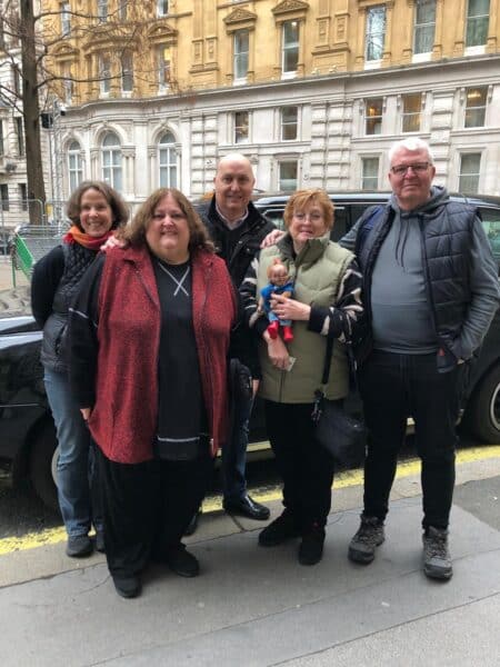 Places To Visit In London In A Day with a group on a sightseeing taxi tour near classic London architecture