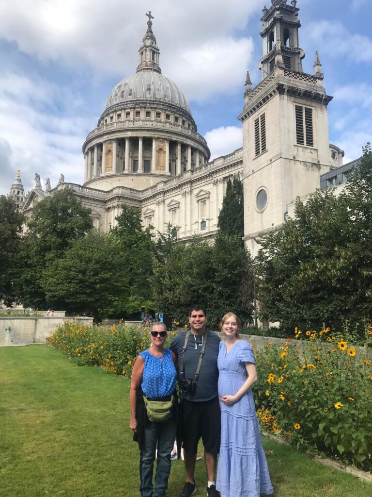Tourists admiring the stunning Westminster Abbey during a taxi tour