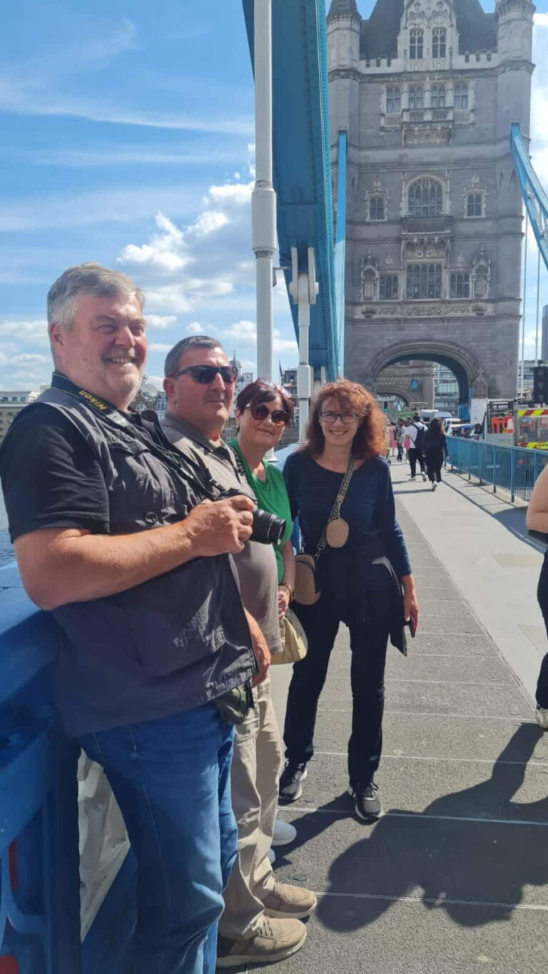 10 Best Places In London - Tourists enjoying a sightseeing tour on Tower Bridge with London Sightseeing Taxi Tours