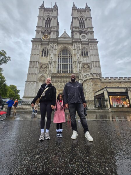 Tourists stopping for photos at London landmarks during a black cab tour