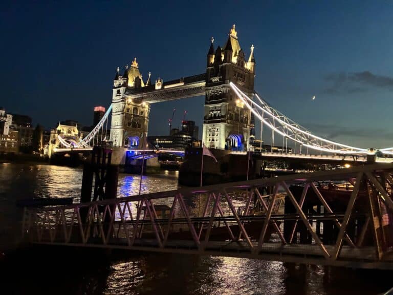 Tower of London VIP tour experience featuring iconic London landmarks like Tower Bridge at night, provided by London Sightseeing Taxi Tours for private group tours