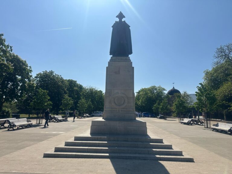 Historic statue of Cardinal John Henry Newman in Kensington during full day london tour with London Sightseeing Taxi Tours