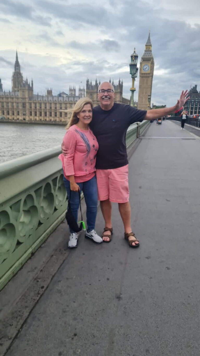 Visitors enjoying Must Visit Places Near London with Big Ben and Houses of Parliament during a London Sightseeing Taxi Tours experience