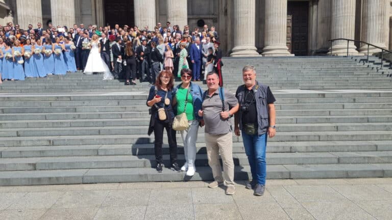 Visitors exploring iconic landmarks on london private tours by car with London Sightseeing Taxi Tours, featuring wheelchair-accessible vehicles for up to six people