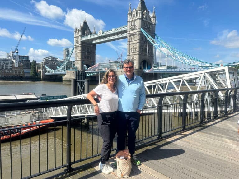 People visiting Tower Bridge on a london england tours sightseeing taxi tour