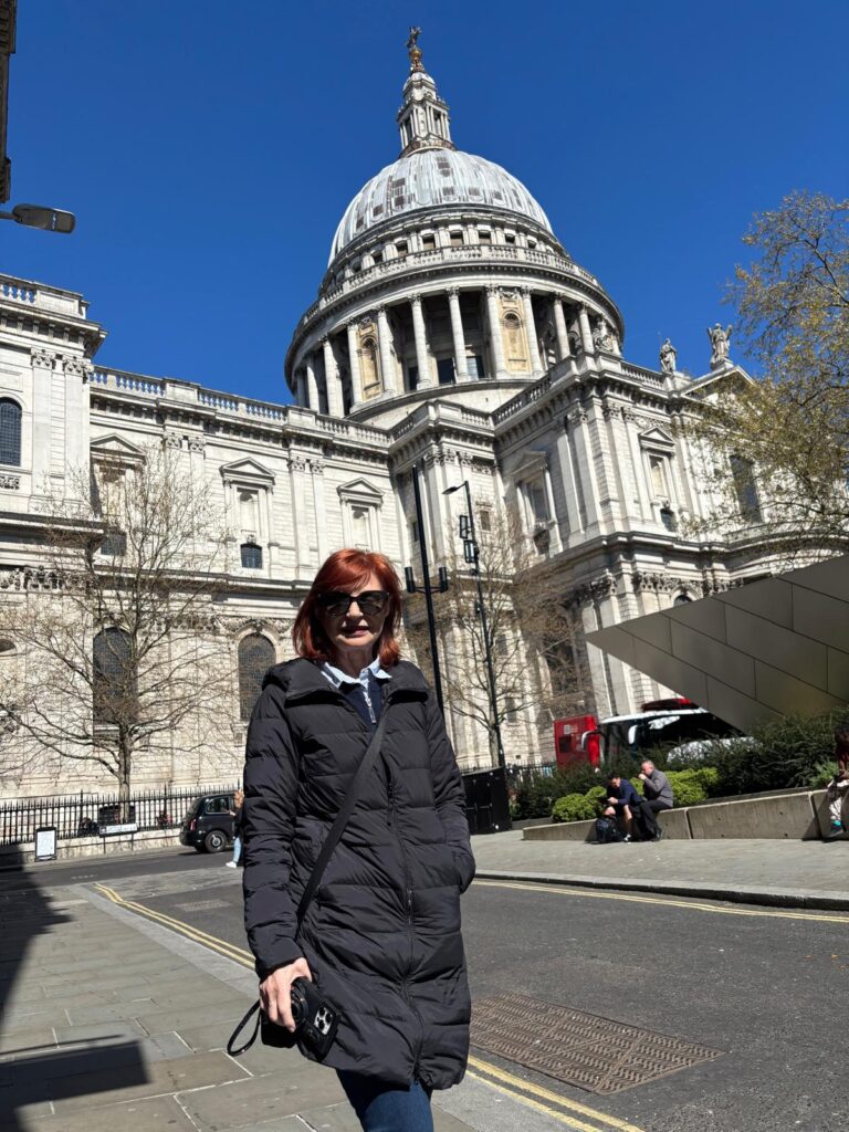 Visitor exploring St. Paul's Cathedral during a London 1 day tour package with London Sightseeing Taxi Tours, offering value-packed experiences for up to six people including wheelchair accessibility [web:4]