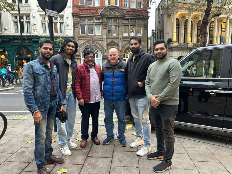 Tourists experiencing hidden gardens in London taxi tours
