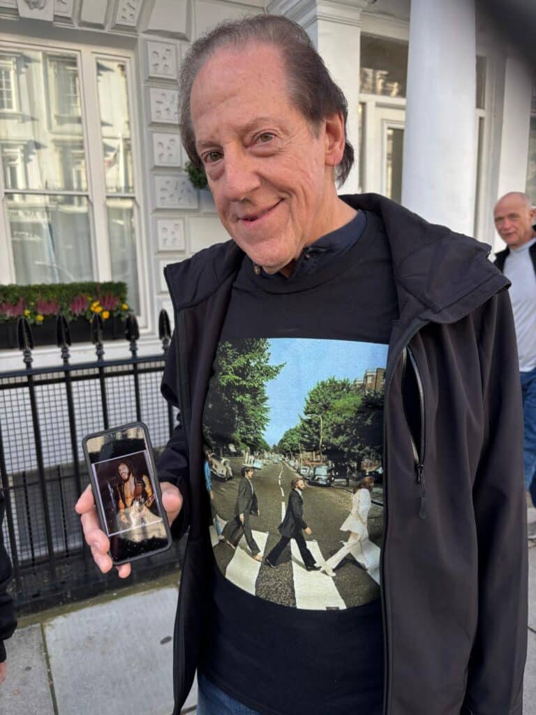 Knowledgeable black cab driver providing insights during themed black cab tours in London.