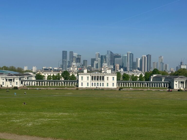 Private tours in London England showcasing Greenwich Park with Queen's House and Canary Wharf skyline for sightseeing taxi tours