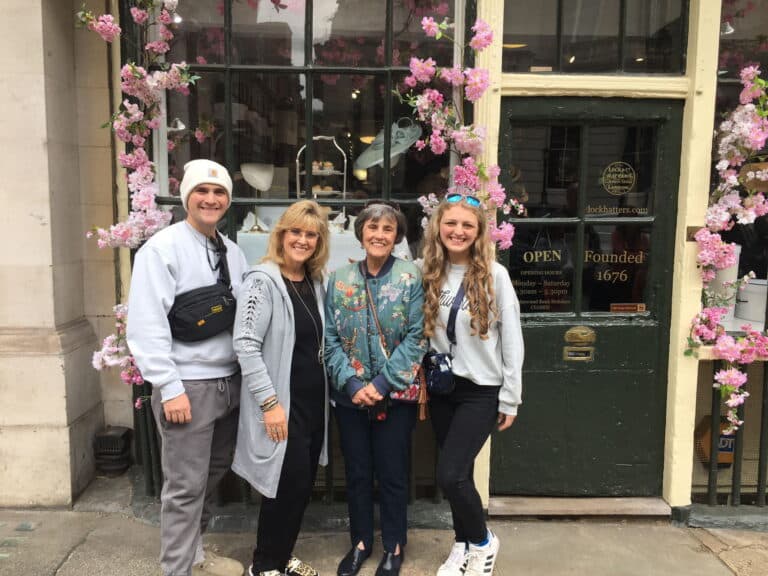 stonehenge and bath day trip from london with London Sightseeing Taxi Tours family enjoying historical sites