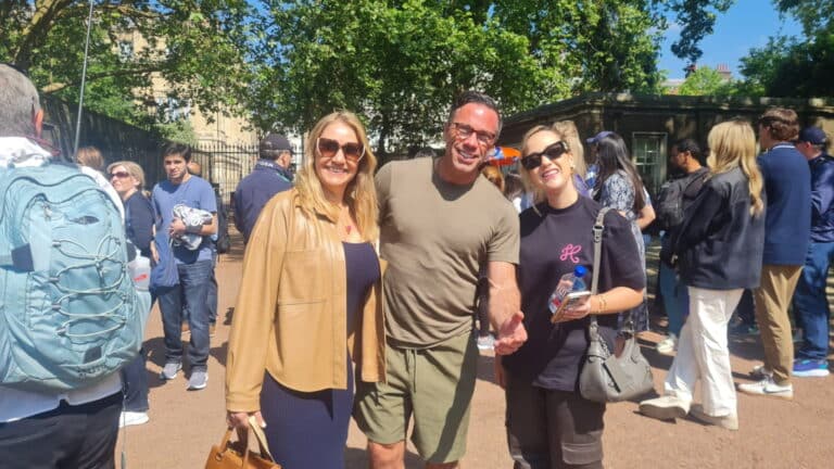 Premium tours London reviews featuring a group of tourists visiting iconic London spots with London Sightseeing Taxi Tours, showcasing accessible and value-driven experiences