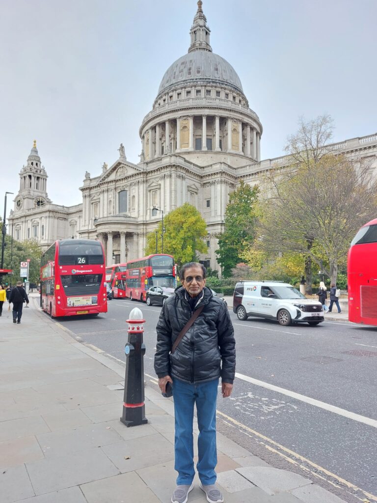 Visitors enjoying guided tours in London England with London Sightseeing Taxi Tours, featuring iconic St. Paul's Cathedral and red double-decker buses