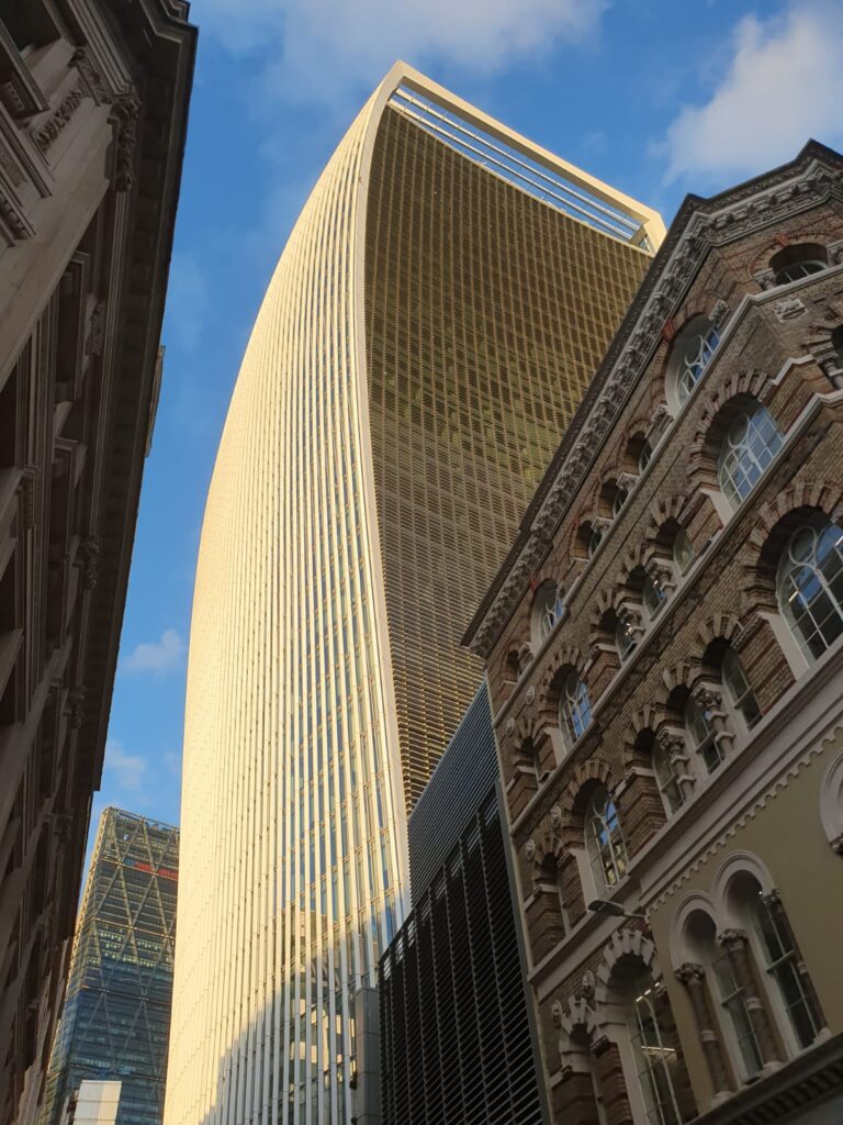 Group of people and private tour guide in England exploring London landmarks