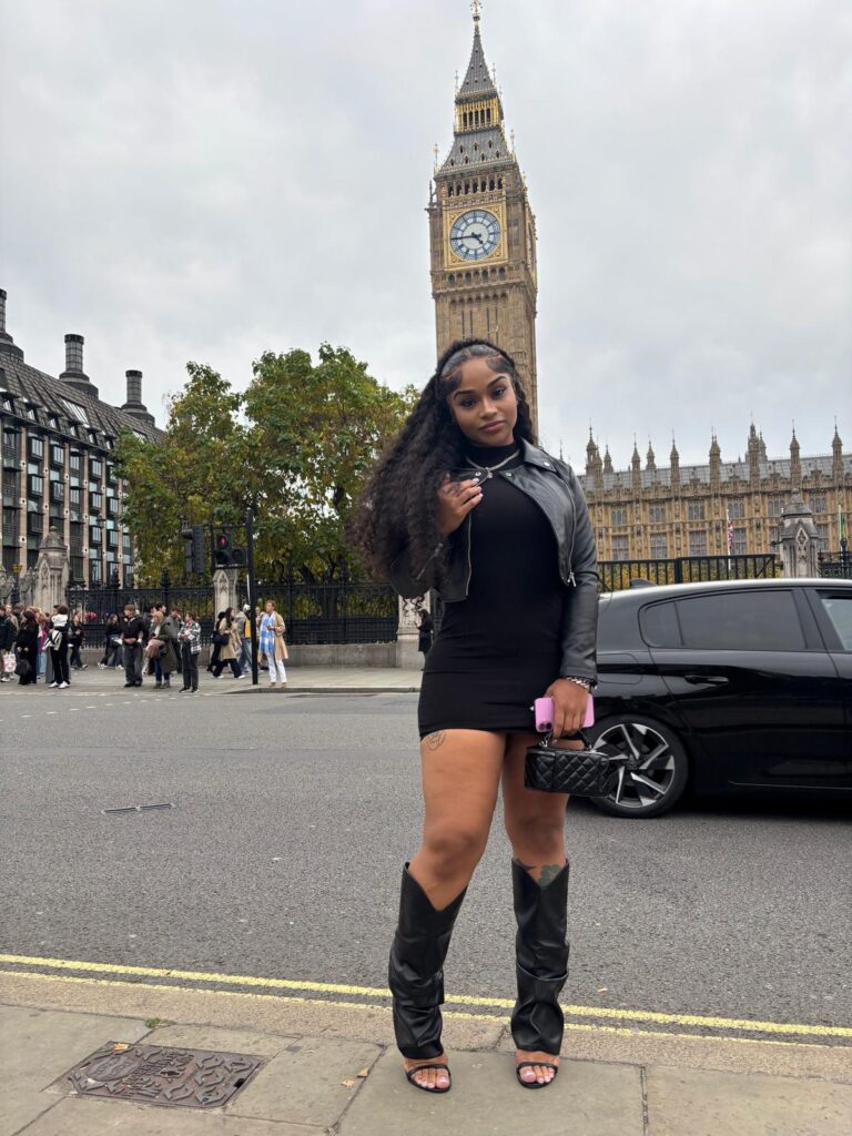Tourists enjoying a guided taxi tour through London's iconic landmarks with UK local tour package