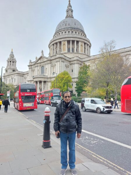 Visitors enjoying guided day trips from London in a classic black cab for sightseeing
