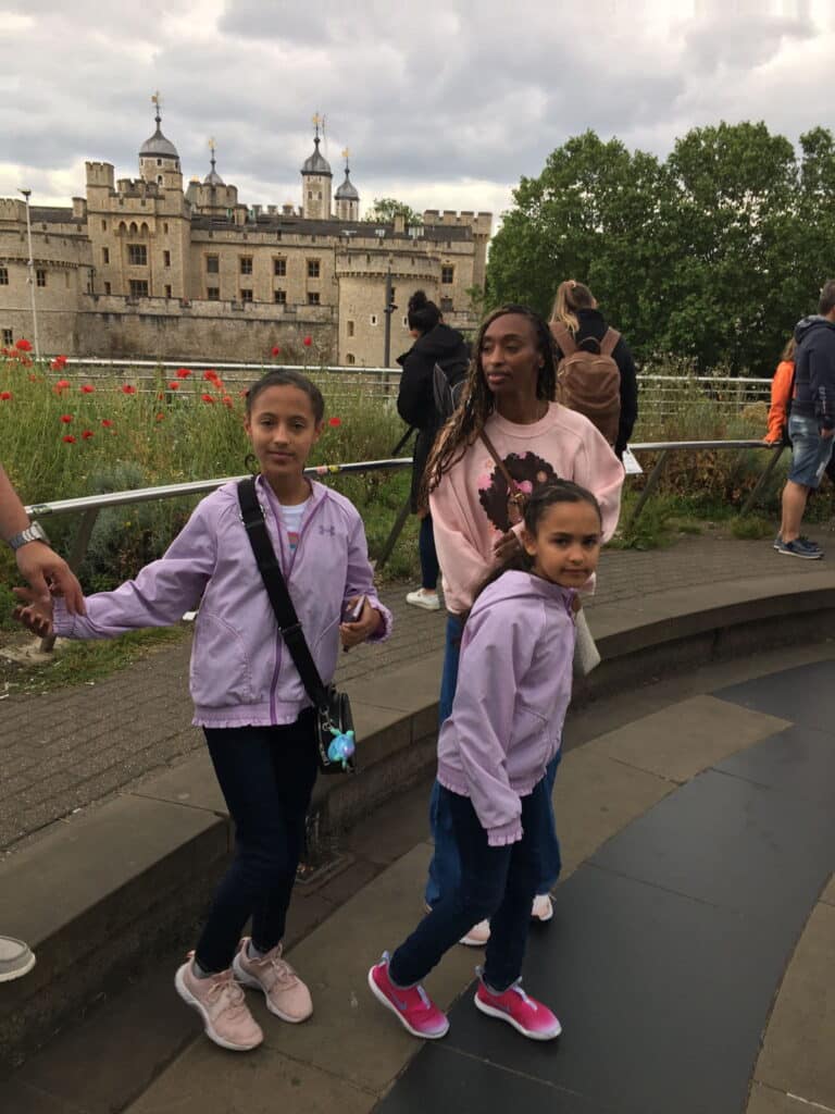 Tourists enjoying tours around England in a London black cab