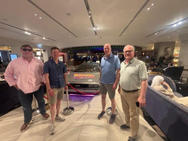 Iconic black cab touring London Christmas lights 2025 with visitors