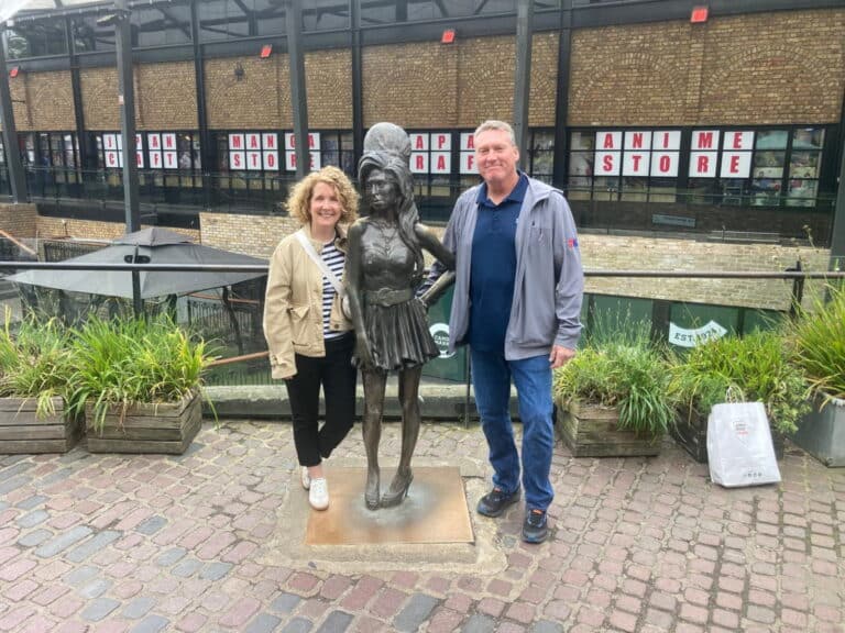 London Christmas lights taxi tour with guide on Oxford Street with festive decorations