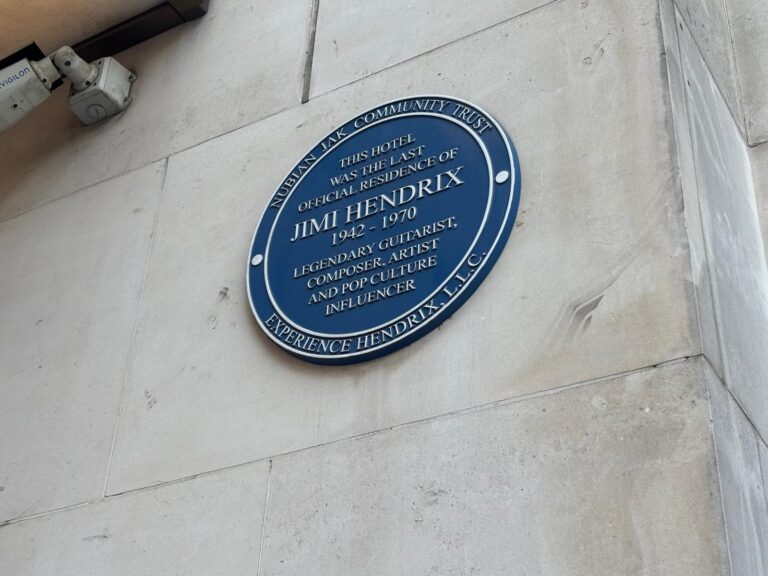 Visitors enjoying cheapest London Christmas lights tour on Oxford Street