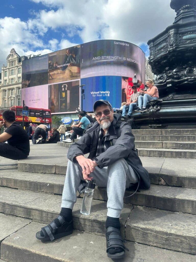 Senior travelers enjoying a London taxi tour with iconic black cab