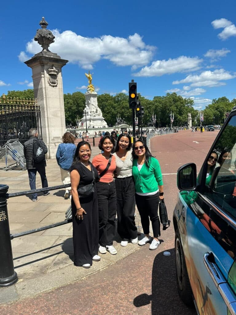 Group enjoying a City of London walking tour with London Sightseeing Taxi Tours
