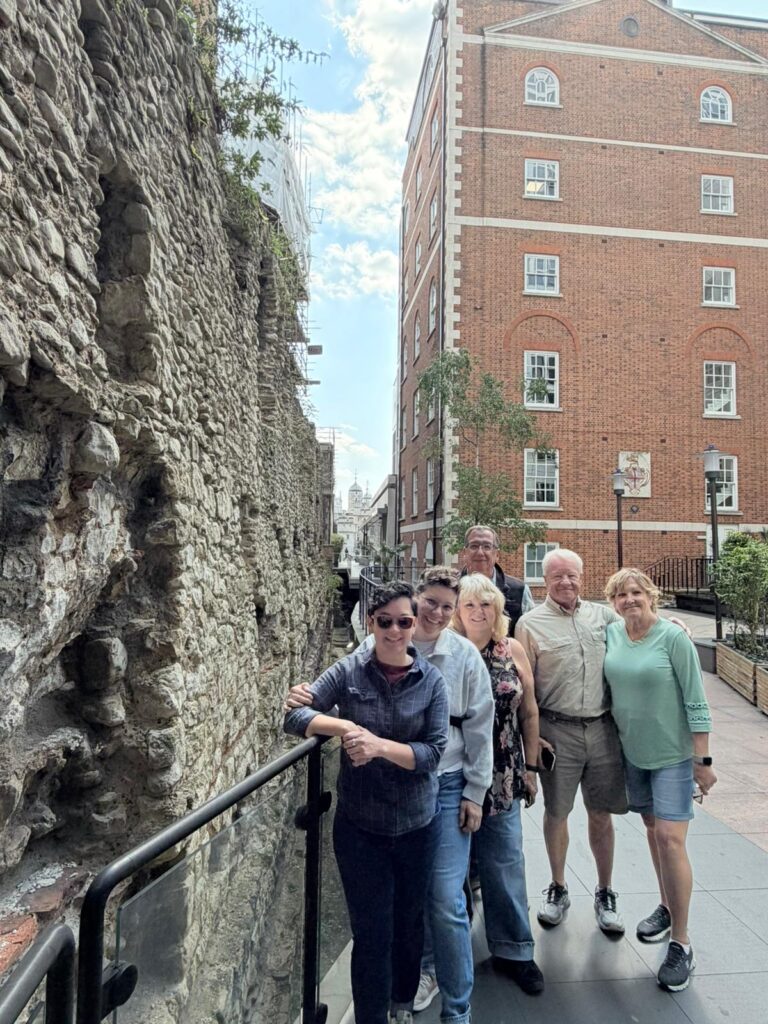 Iconic London landmarks through a chauffeur's eyes with tourists in a taxi